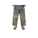 A pair of rugged chaps by Black Water Trap Supply in olive green, shown on a cropped model from the waist down wearing  hiking shoes against a plain white background.